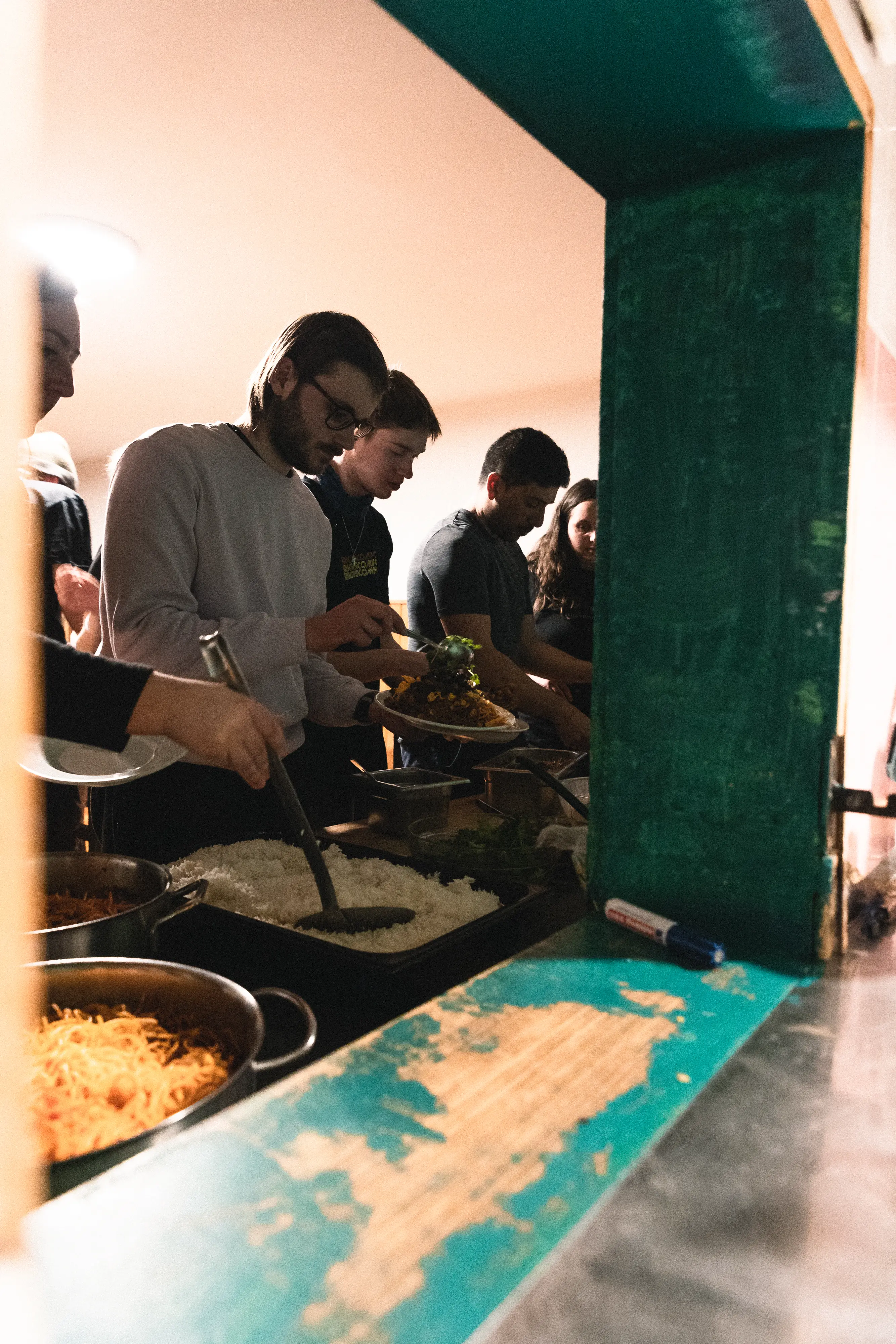 Cooking and eating dinner together as a family Chalet Family Dinners