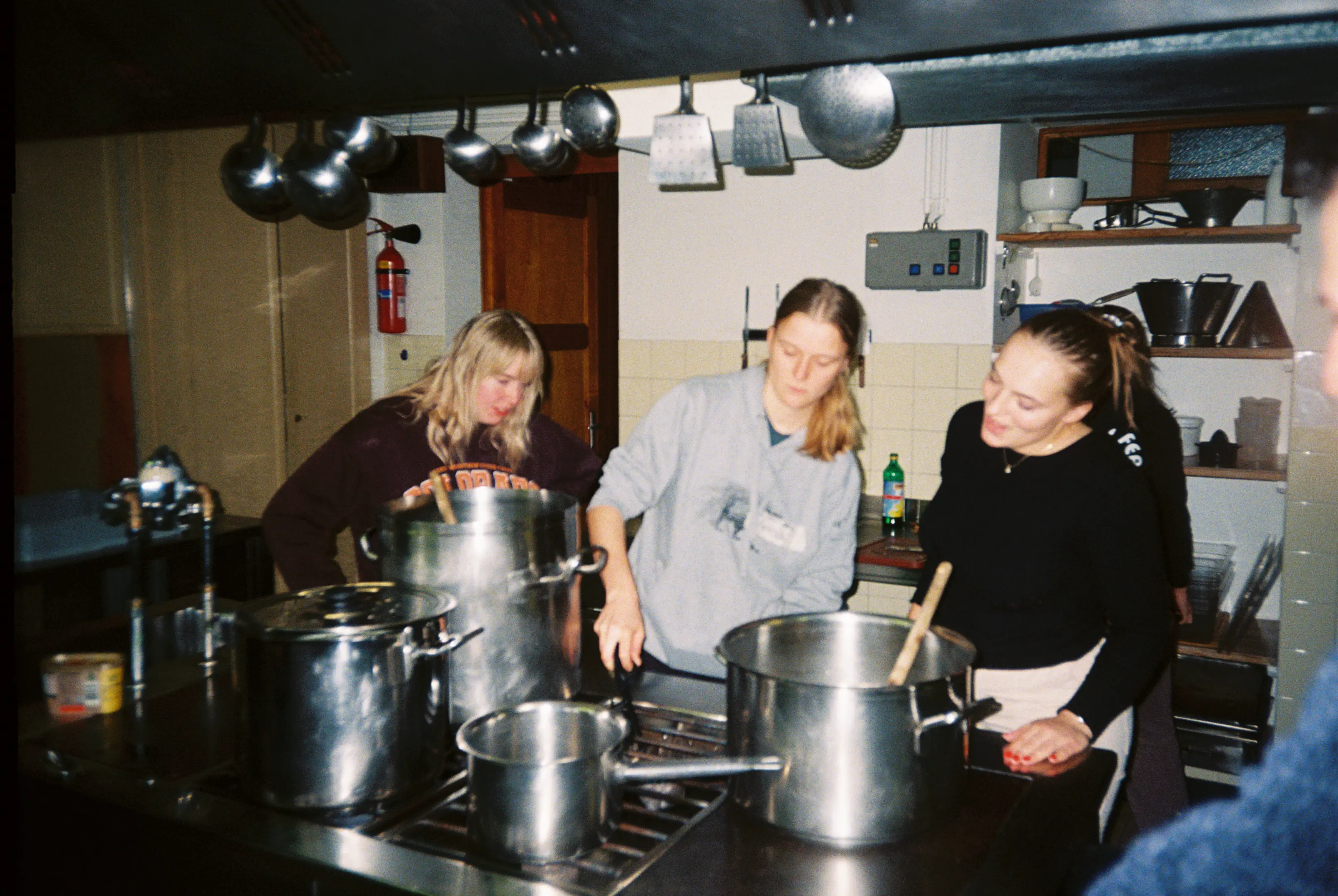Analog snapshot of the evening dinner crew in full swing 📸